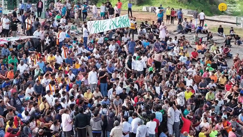 Thousands of Bengaluru citizens gather at Lalbagh to protest the 5% park land diversion bill and proposed tunnel road threatening the city's iconic green spaces.